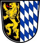 Wieslochs Stadtwappen,links goldener Löwe mit schwarzem Hintergrund und rechts weiß blaues Rautenmuster